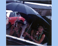 1968 02 13 Hau-Lien Tawian  Aborigeine Girl held umbrellas due to the rain) (1).jpg